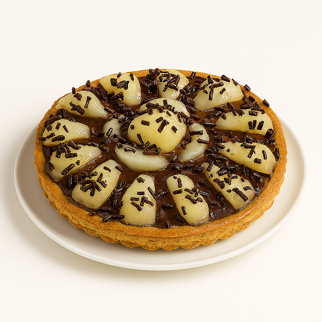 Angled view of a pear and chocolate tart placed on a white plate, against a white background. The tart displays glossy chocolate filling topped with pear slices arranged in a circular pattern and sprinkled with chocolate pieces.